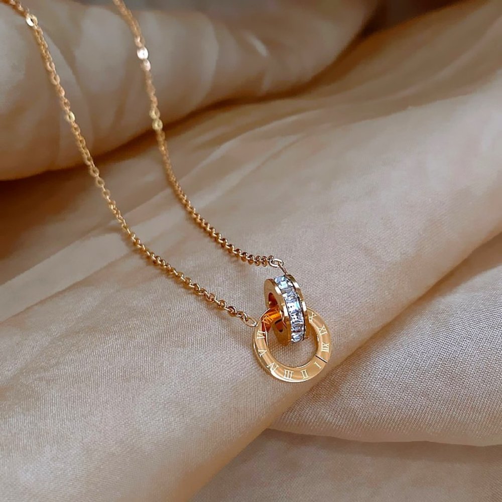 GOLICC Ring and Loop Zircon Necklace